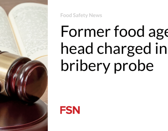 Former food agency head charged in bribery probe